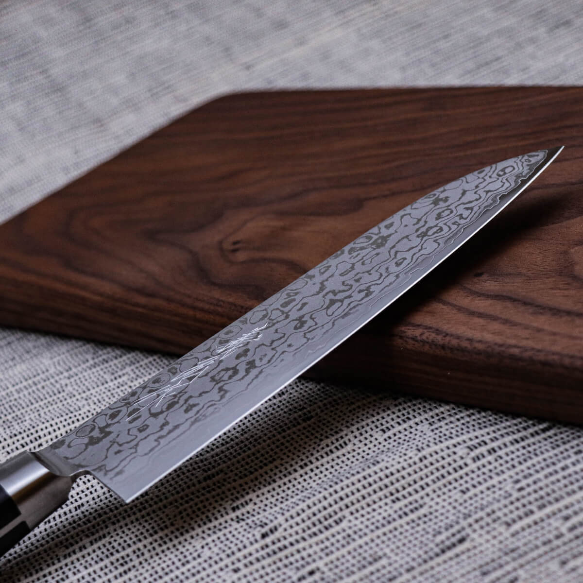 Yoshihiro VG10 17-layer Damascus Steel Santoku Black Pakkawood Handle